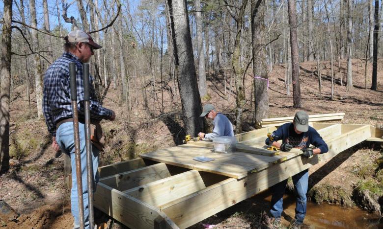 Scene of bridge work being done at Cane Creek State Park. 